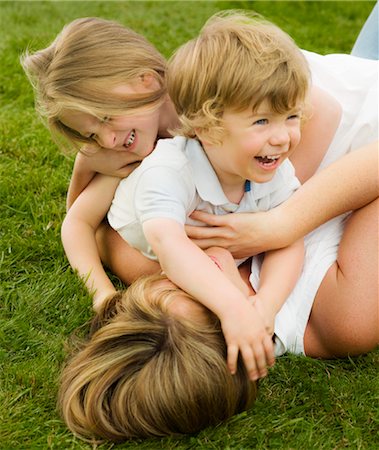 simsearch:649-05950793,k - A mother playing with her children Stock Photo - Premium Royalty-Free, Code: 649-03294358