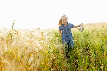 simsearch:649-06352471,k - Girl running in a wheat field Stock Photo - Premium Royalty-Free, Code: 649-03296283