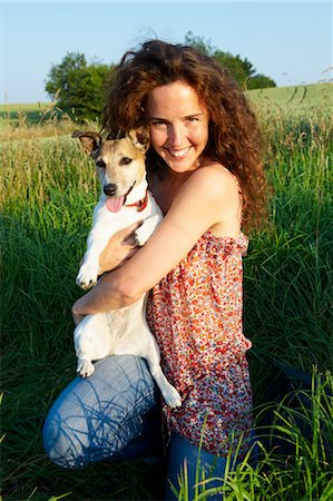 simsearch:6122-07706771,k - Woman with dog, in a wheat field Stock Photo - Premium Royalty-Free, Code: 649-03296363