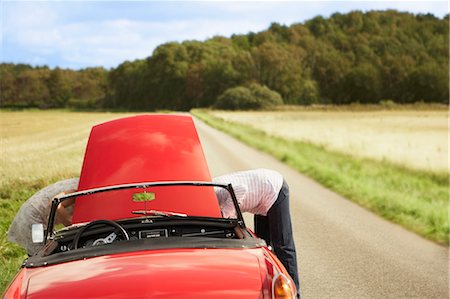 road together - Couple with car, broken down Stock Photo - Premium Royalty-Free, Code: 649-03296513