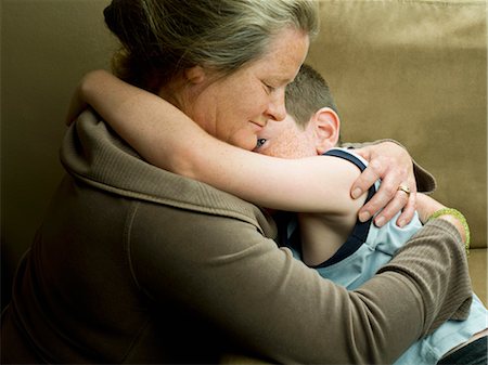 simsearch:649-06943770,k - A mum hugging her son Foto de stock - Sin royalties Premium, Código: 649-03297374