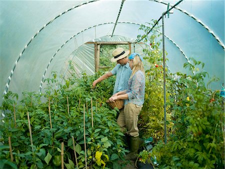 simsearch:649-07238535,k - A couple in a green house Stock Photo - Premium Royalty-Free, Code: 649-03297460