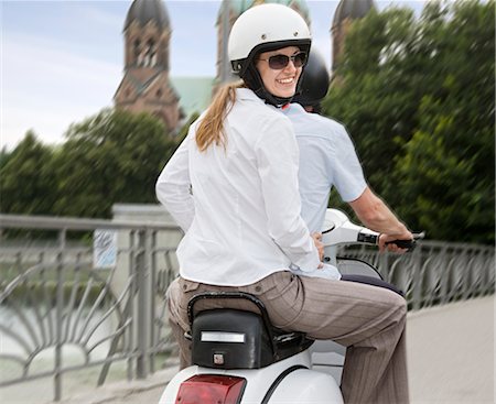 scooter rear view - couple on scooter Stock Photo - Premium Royalty-Free, Code: 649-03292780