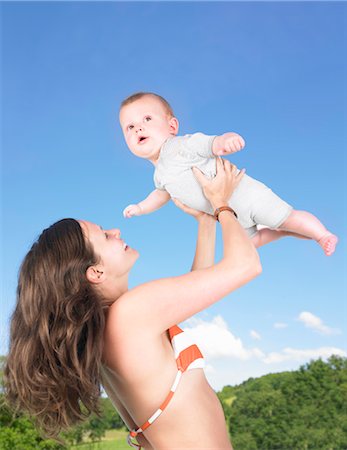 simsearch:649-05819761,k - mother holding baby up in air Stock Photo - Premium Royalty-Free, Code: 649-03293742