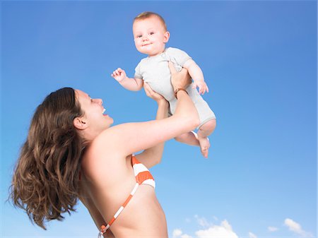 simsearch:649-05819761,k - mother holding baby up in air Stock Photo - Premium Royalty-Free, Code: 649-03293743