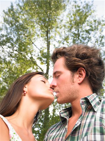 simsearch:649-03796564,k - couple kissing under trees Stock Photo - Premium Royalty-Free, Code: 649-03293893