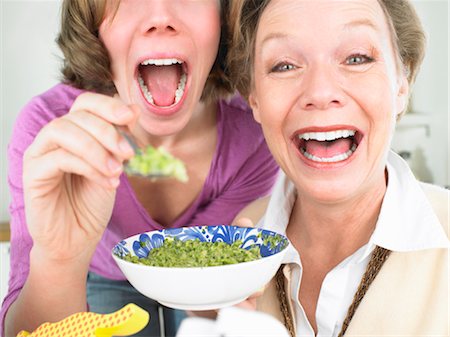 pureed - Grandmother and mother feeding baby Stock Photo - Premium Royalty-Free, Code: 649-03363253