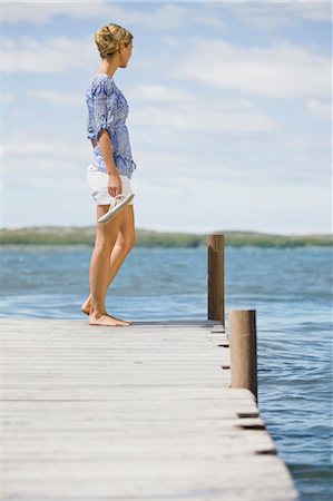 flips flops - Woman at a lake Stock Photo - Premium Royalty-Free, Code: 649-03447182