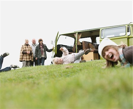 family fun in hill - Children playing rolley polley Stock Photo - Premium Royalty-Free, Code: 649-03447755