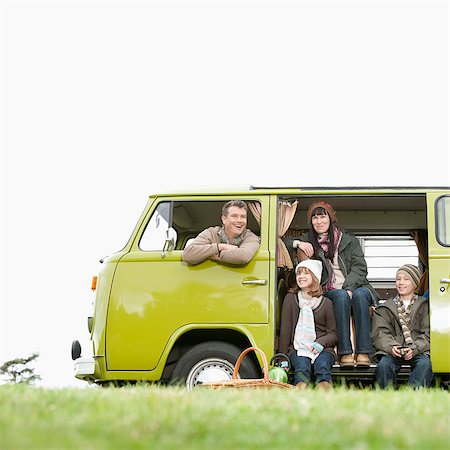 Family looking out from camper van Stock Photo - Premium Royalty-Free, Code: 649-03447758