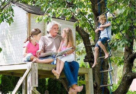 story - Grandfather reading a book Stock Photo - Premium Royalty-Free, Code: 649-03448390