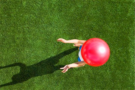 Girl playing ball Stock Photo - Premium Royalty-Free, Code: 649-03465504