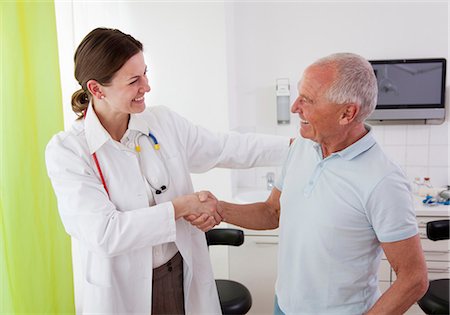 Doctor with patient in surgery Stock Photo - Premium Royalty-Free, Code: 649-03487233