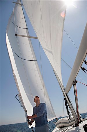 sailing boats activities - Man on yacht Stock Photo - Premium Royalty-Free, Code: 649-03510975