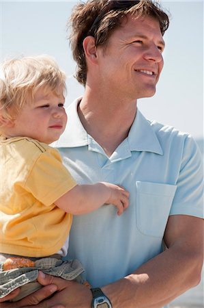 simsearch:6116-07236010,k - Father holding son Stock Photo - Premium Royalty-Free, Code: 649-03511033
