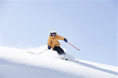 simsearch:649-05555429,k - Young boy skiing through fresh powder Stock Photo - Premium Royalty-Free, Code: 649-03565907