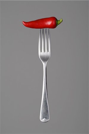 fork - Fork with a chili pepper Foto de stock - Sin royalties Premium, Código: 649-03566434