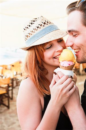 eating icecream - Young couple eating ice cream Stock Photo - Premium Royalty-Free, Code: 649-03606098