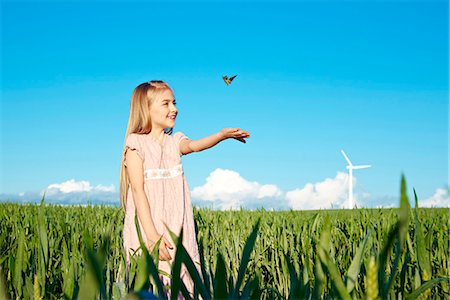 energy concept - Girl with butterfly Stock Photo - Premium Royalty-Free, Code: 649-03621518