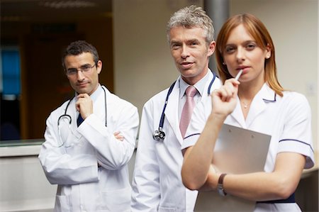 simsearch:649-03771564,k - Doctor's and nurse in waiting area Stock Photo - Premium Royalty-Free, Code: 649-03621570