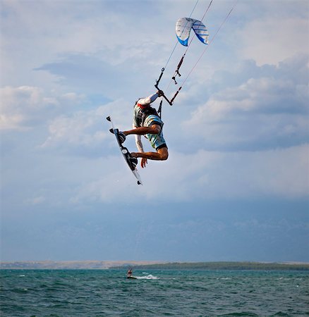 summer picture with kite - Kitesurfer jumping Stock Photo - Premium Royalty-Free, Code: 649-03622047