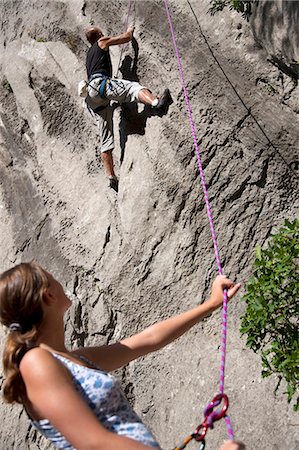 simsearch:649-05555429,k - Rock climber securing partner Stock Photo - Premium Royalty-Free, Code: 649-03622055