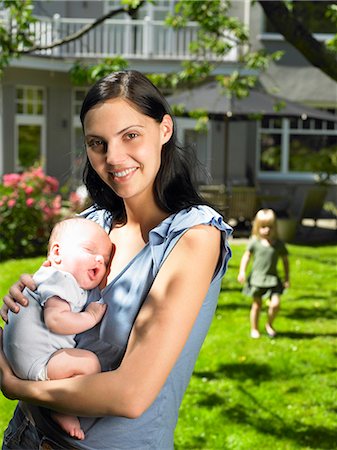 simsearch:649-05950793,k - Mother and kids in the garden Stock Photo - Premium Royalty-Free, Code: 649-03666384