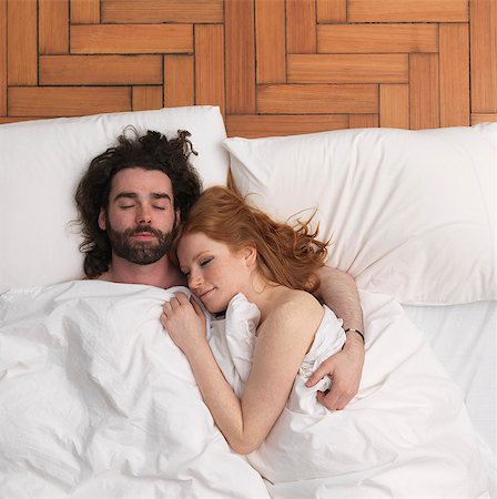 simsearch:649-01696405,k - Couple sleeping in bed Stock Photo - Premium Royalty-Free, Code: 649-03666742
