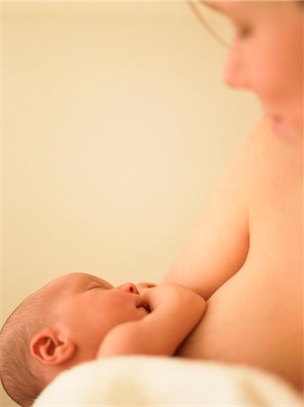 Baby sleeping in mother's arms Stock Photo - Premium Royalty-Free, Code: 649-03666783