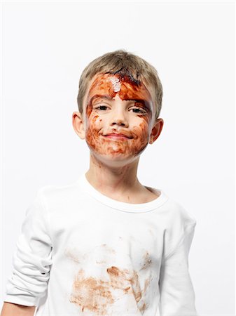 funny pose - Boy covered in chocolate sauce Foto de stock - Sin royalties Premium, Código: 649-03774376