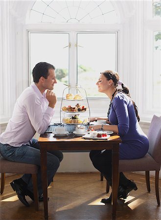 sitting at a hotel - Couple having tea Stock Photo - Premium Royalty-Free, Code: 649-03775183