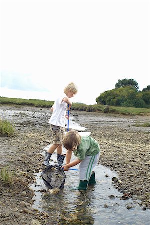 simsearch:649-05649029,k - Two boys fishing with nets in a stream Stock Photo - Premium Royalty-Free, Code: 649-03770447