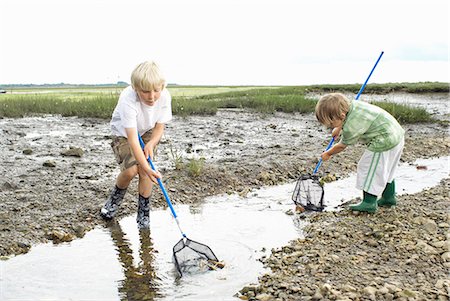 simsearch:649-03775589,k - Two boys playiing in stream with nets Stock Photo - Premium Royalty-Free, Code: 649-03770449