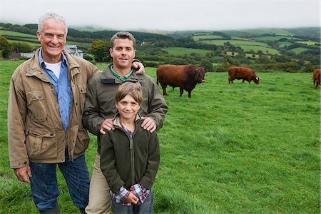 picture of a happy farming family - Father, son and Grandfather with cows Stock Photo - Premium Royalty-Free, Code: 649-03770862