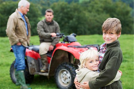 Family on quad bike Stock Photo - Premium Royalty-Free, Code: 649-03770880