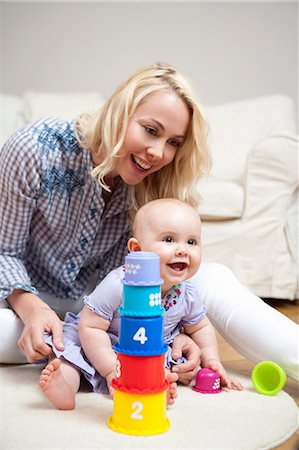 simsearch:628-07072734,k - Baby with Mother in bed Stock Photo - Premium Royalty-Free, Code: 649-03772174