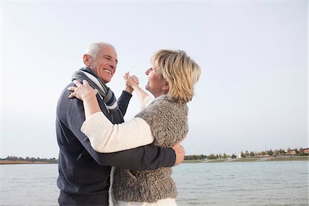 senior couple fun - Senior couple dancing by lake Stock Photo - Premium Royalty-Free, Code: 649-03773959