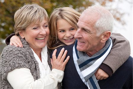 Girl and grandparents in autumn Stock Photo - Premium Royalty-Free, Code: 649-03773951