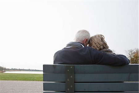 Senior couple sitting on bench in park Stock Photo - Premium Royalty-Free, Code: 649-03773971