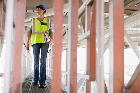 Female worker on construction site Stock Photo - Premium Royalty-Free, Code: 649-03796359