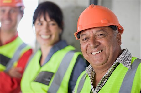 Group of smiling workers Stock Photo - Premium Royalty-Free, Code: 649-03796496