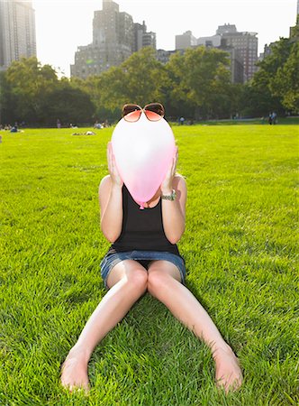 simsearch:649-06623087,k - Woman playing with a balloon in a park Stock Photo - Premium Royalty-Free, Code: 649-03796736