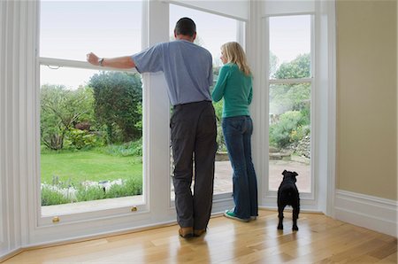 simsearch:649-03447245,k - Couple and dog admiring new home Stock Photo - Premium Royalty-Free, Code: 649-03858719