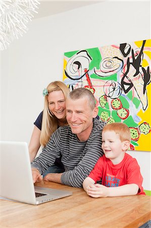simsearch:649-06304951,k - Family using laptop together Stock Photo - Premium Royalty-Free, Code: 649-03884155