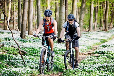 spring fitness - Couple mountain biking together Stock Photo - Premium Royalty-Free, Code: 649-03884363