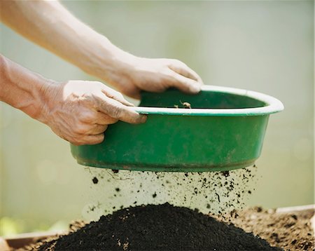 farm active - Hands sifting soil outdoors Stock Photo - Premium Royalty-Free, Code: 649-03881850