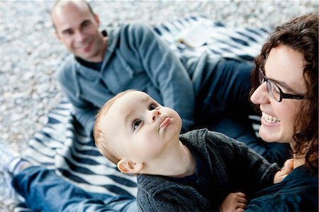 simsearch:649-03770663,k - Family relaxing outdoors together Stock Photo - Premium Royalty-Free, Code: 649-03881889