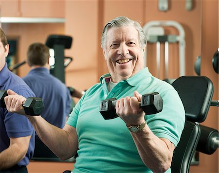senior men at the gym - Older man lifting weights in gym Stock Photo - Premium Royalty-Free, Code: 649-03881953
