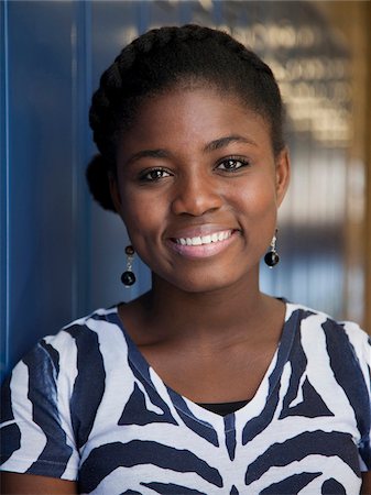 female student locker - USA, Utah, Spanish Fork, Portrait of school girl (14-15) in corridor Stock Photo - Premium Royalty-Free, Code: 640-05761065