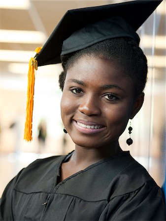 student graduating - USA, Utah, Spanish Fork, Portrait of female graduate student (16-17) in corridor Stock Photo - Premium Royalty-Free, Code: 640-05761074